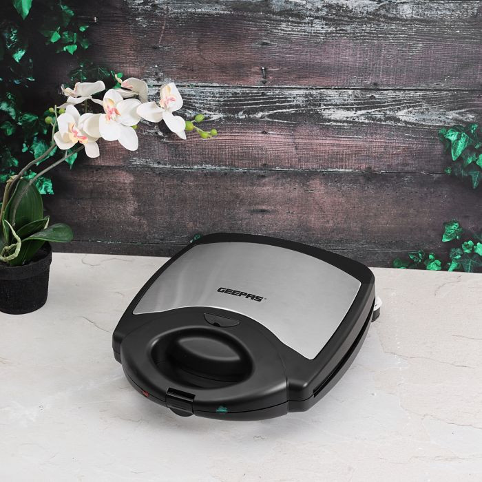 Geepas Nut Maker GNM6158  Makes 25 Pcs  1400 Watts Strong Nut Snack Maker with Non-Stick Pans  Warm Handle  Base that Won't Slide  Small and Easy to Store Upright