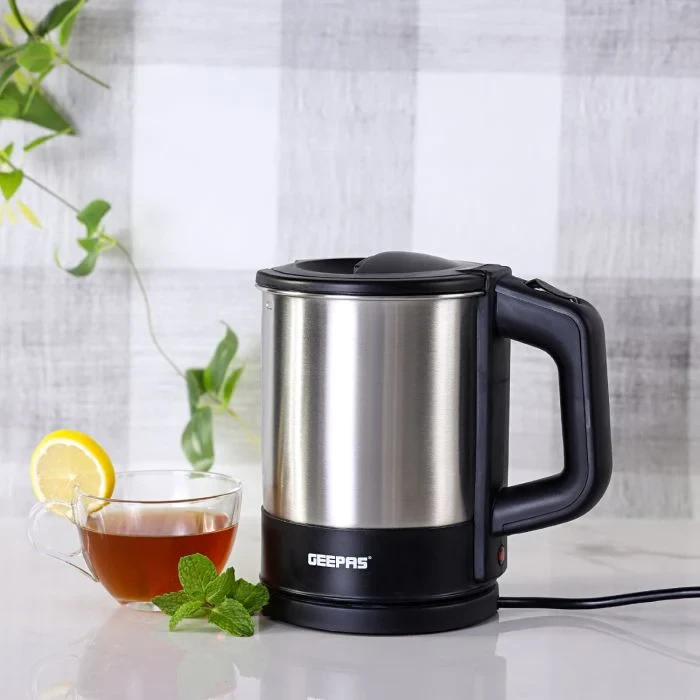 Geepas GK5418 1350W Travel Electric Kettle with stainless steel housing, features boil-dry and overheating protection, ideal for boiling water, making tea, and preparing coffee, comes in a 1.0 liter c