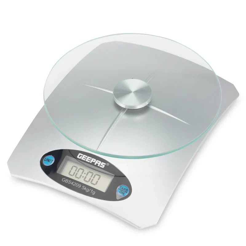 The Geepas Digital Kitchen Scale GBS4209 has a 5kg capacity and features a safety glass platform. It offers high precision measurement and a clear, easy-to-read display. The design is compact and dura