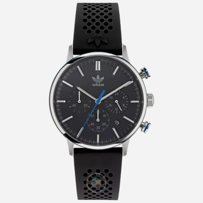 Adidas Originals Code One is a watch that has a quartz movement, a silicone strap, and it works as a stopwatch with chronograph features.